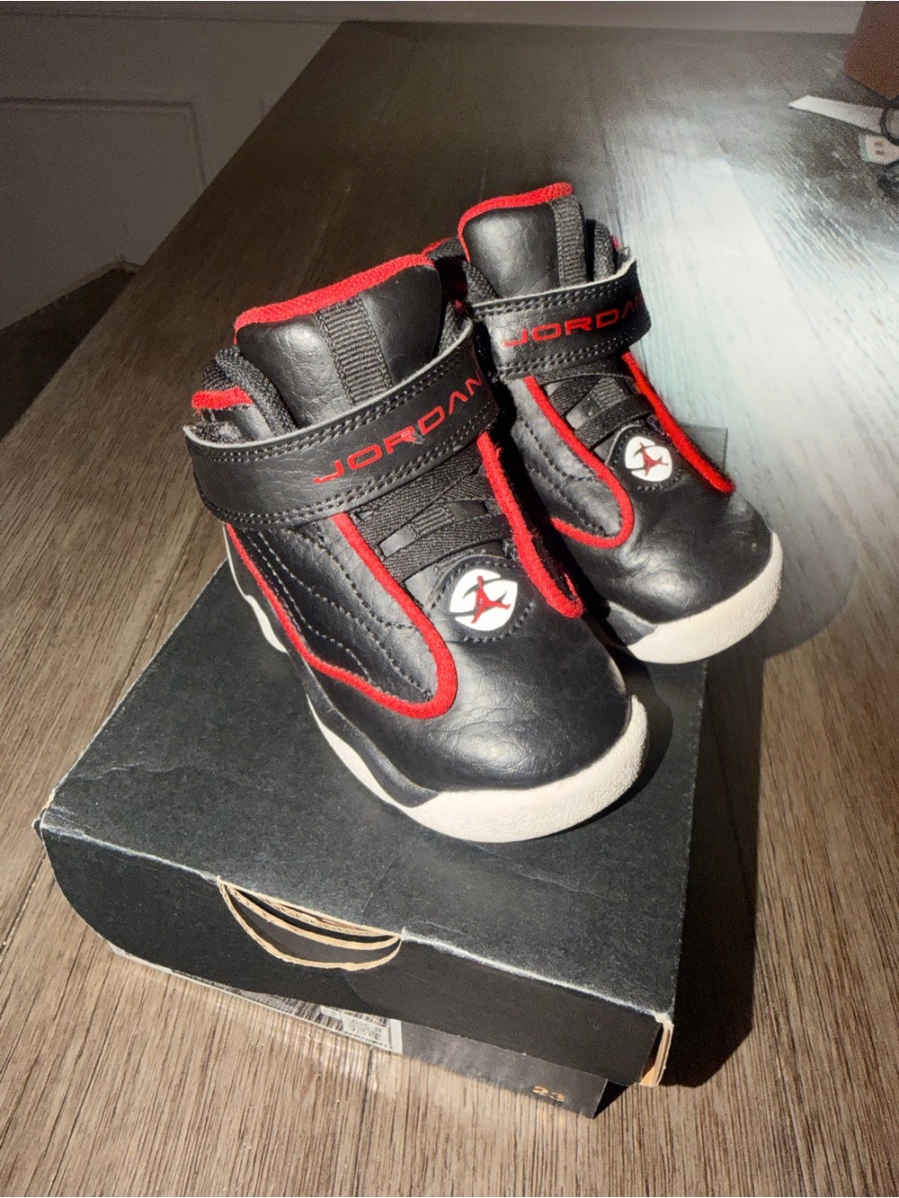 Jordan Kids Black and Red High-Top Sneakers with Strap